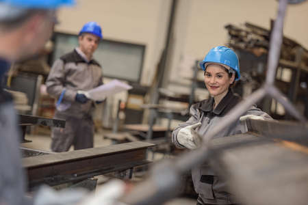 Happy male engineer and female supervisor showing and ok and thumbs up sighの写真素材