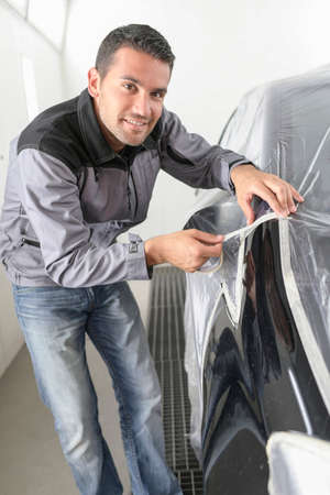 How to properly mask a car body for paintingの写真素材