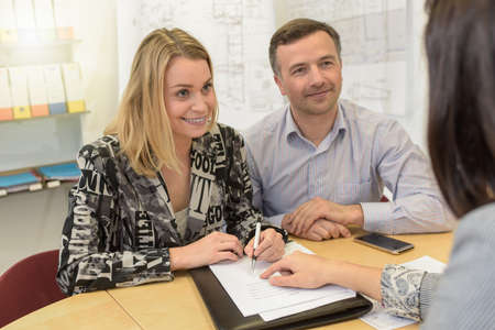signing a loan to the bankの写真素材