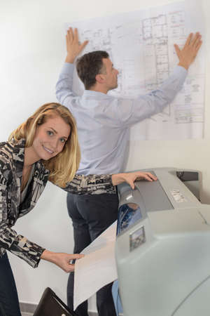 printing plans on a large format printer in a reprography workshopの写真素材