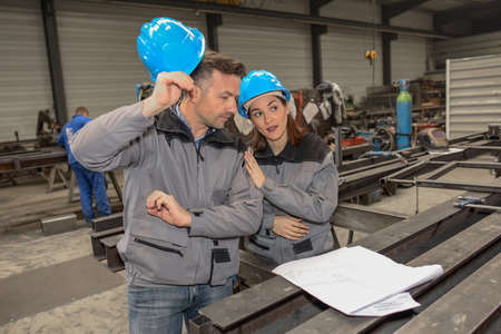 Sharing information between workers in the metallic industryの写真素材