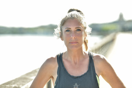 Portrait of an athletic running woman.の写真素材