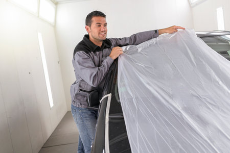How to properly mask a car body for paintingの写真素材