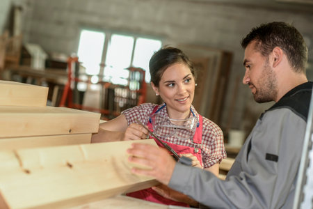 Carpenters choose wood for a new projectの写真素材