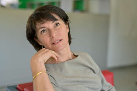 Portrait of a mature secretary candidate for a new job waiting for her interview with the bossの写真素材