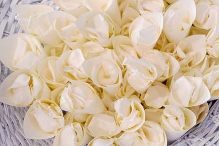 A basket of rice and petals of roses for the wedding