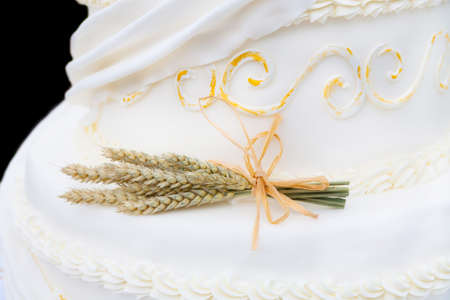 beautiful white nuptial cake with rosesの写真素材