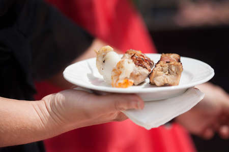 spiedini of meat on the grillの写真素材