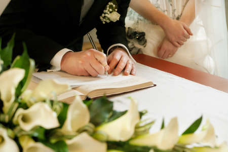 groom  write on registration of marriageの写真素材