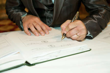 groom  write on registration of marriageの写真素材