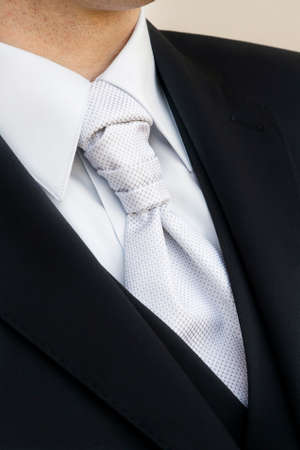 Groom in elegant black suitの写真素材