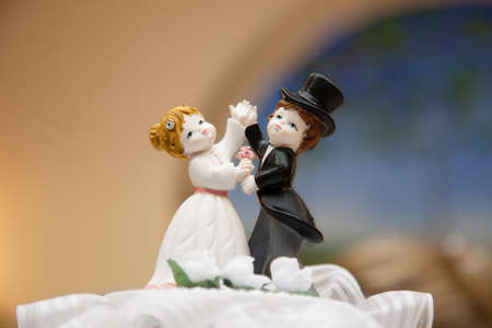 wedding couple topper on the cakeの写真素材