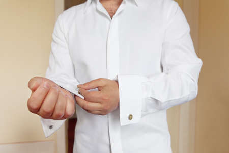 groom wears white shirt and cufflinksの写真素材