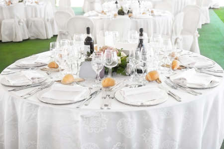 Tables decorated for a party or wedding receptionの写真素材