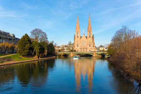 Touristic boat on the river Ili and St. Paul churchのeditorial素材