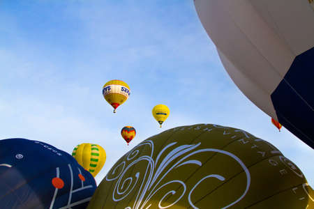 hot-air balloons flying over the mountain,6 january 2015 MondovÃ¬ italy