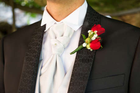 boutonniere in tuxedo lapel