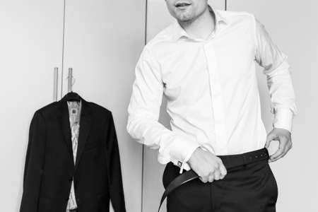 The man in the white shirt and cufflinks.の写真素材