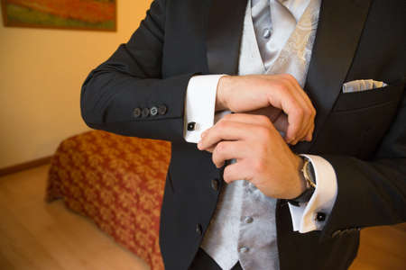 The man in the white shirt and cufflinks.の写真素材