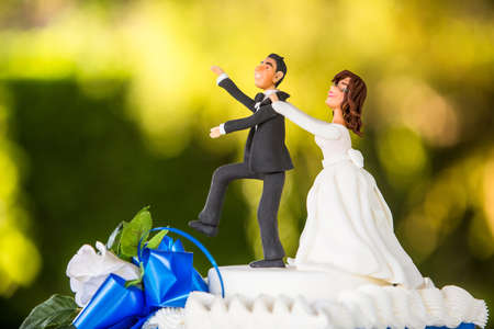 white wedding cake with topperの写真素材