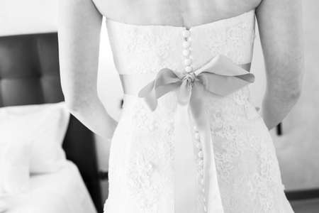 Close-up of bride back in wedding dressの写真素材