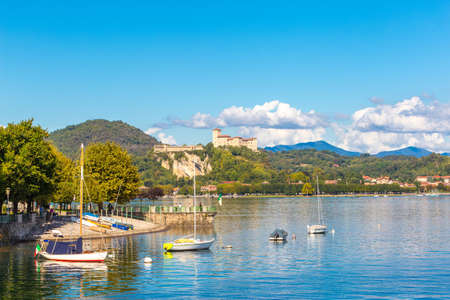 Angera, Lombardy, Italy. 11 September 2017. View of Castle and Rocca of Angera in front of Arona, on Lake Maggiore, Lombardy, Italy.のeditorial素材