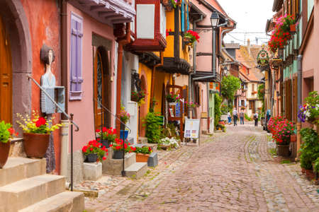 19 June 2012. Half-timbered houses, along the wine route, Eguisheim, Alsace, Haut Rhin, Franceのeditorial素材