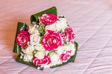 beautiful bouquet of white roses for wedding dayの写真素材