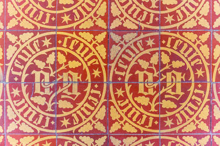 19 September 2019. Detail of ancient tile of Hospice de Beaune or Hotel Dieu in Burgundy region,...