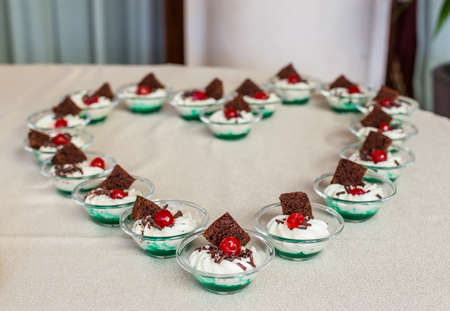 Delicious mini desserts and mini cakesの写真素材