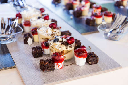 Delicious mini desserts and mini cakesの写真素材