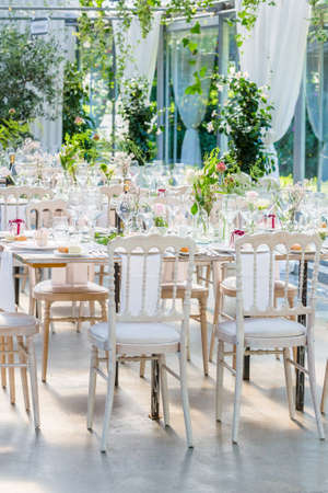 Tables decorated for a party or wedding receptionの写真素材