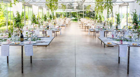 Tables decorated for a party or wedding receptionの写真素材