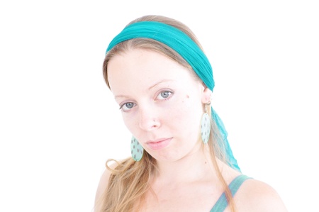 young woman with teal hairbandの写真素材