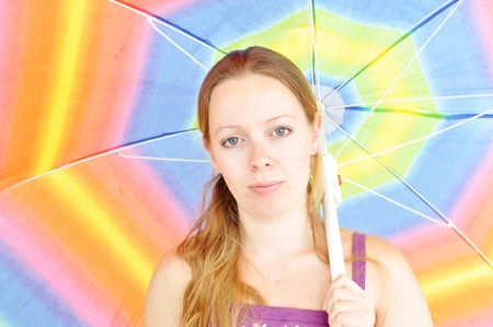 young fresh woman, holding sun umbrellaの写真素材