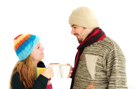 Young couple enjoying a cup of tea/coffee の写真素材