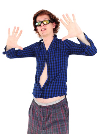 Young man with funny hair and clothes mocking teen superstarの写真素材