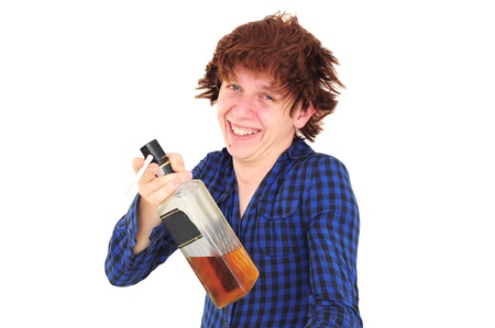 Funny smiling drunk man holding bottle of whiskey and cigaretteの写真素材