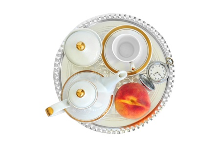 Coffee set, appricot and pocket watch, arranged for breakfast on sliver trayの写真素材