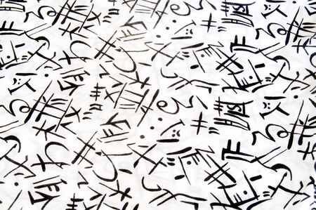 White cloth with abstract black signs