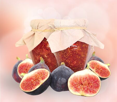 Fresh fig fruits and fig jam in jarsの写真素材