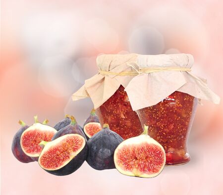 Fresh fig fruits and fig jam in jarsの写真素材