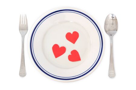 Concept of love - arrangement for dinner with heart shapes in the plateの写真素材