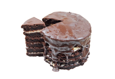 Mini chocolate cake with sliced piece isolated on whiteの写真素材