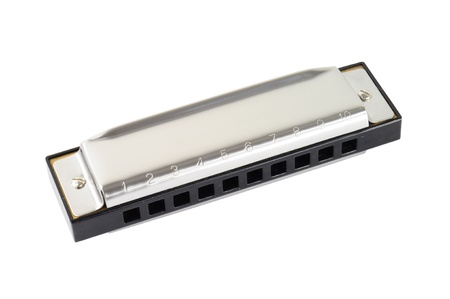 Silver diatonic blues harp isolated on whiteの写真素材