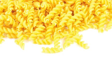Closeup of  fusilli on white backgroundの写真素材