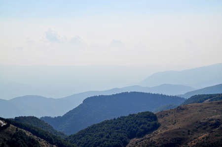 Panoramic view of mountain peaks in morningの写真素材