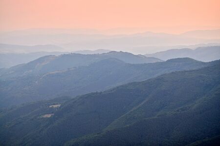 Panoramic view of mountain peaks at dawnの写真素材
