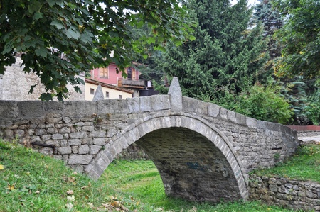 Small stone bridge over dried riverの写真素材