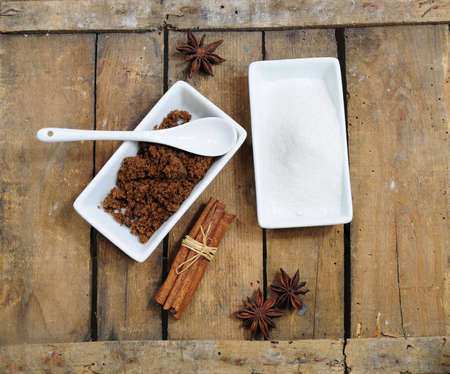 Sweet ingredients - white and brown sugar, chocolate, cinnamon and aniseの写真素材